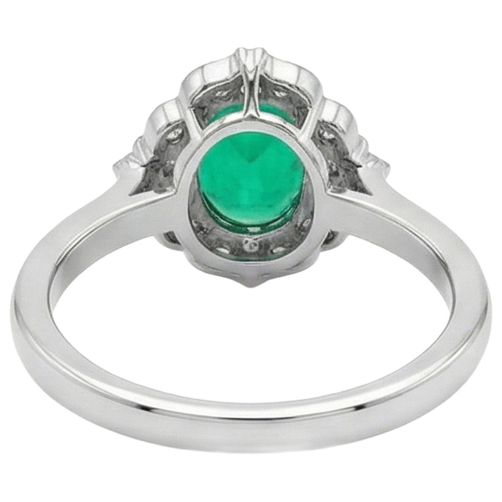 natural round emerald 2ct ring on white background