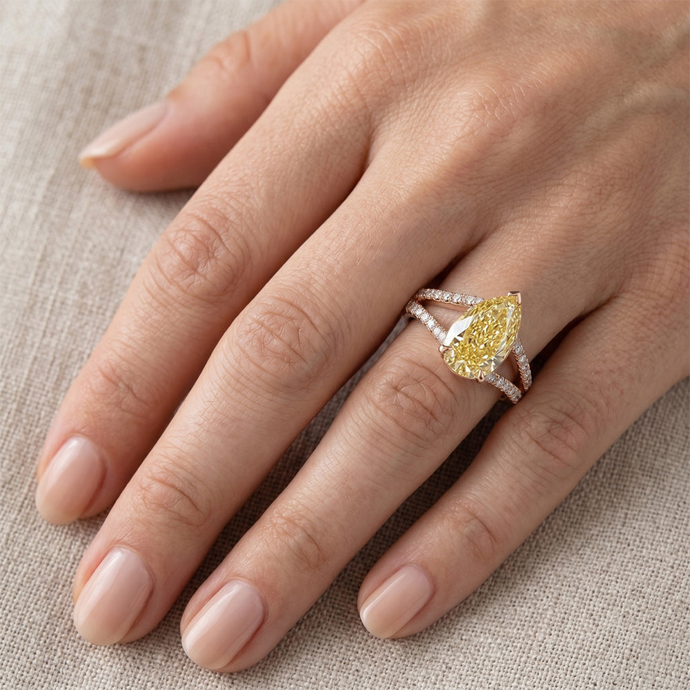 Luxurious Solitaire with Side Stones with VVS Fancy Yellow