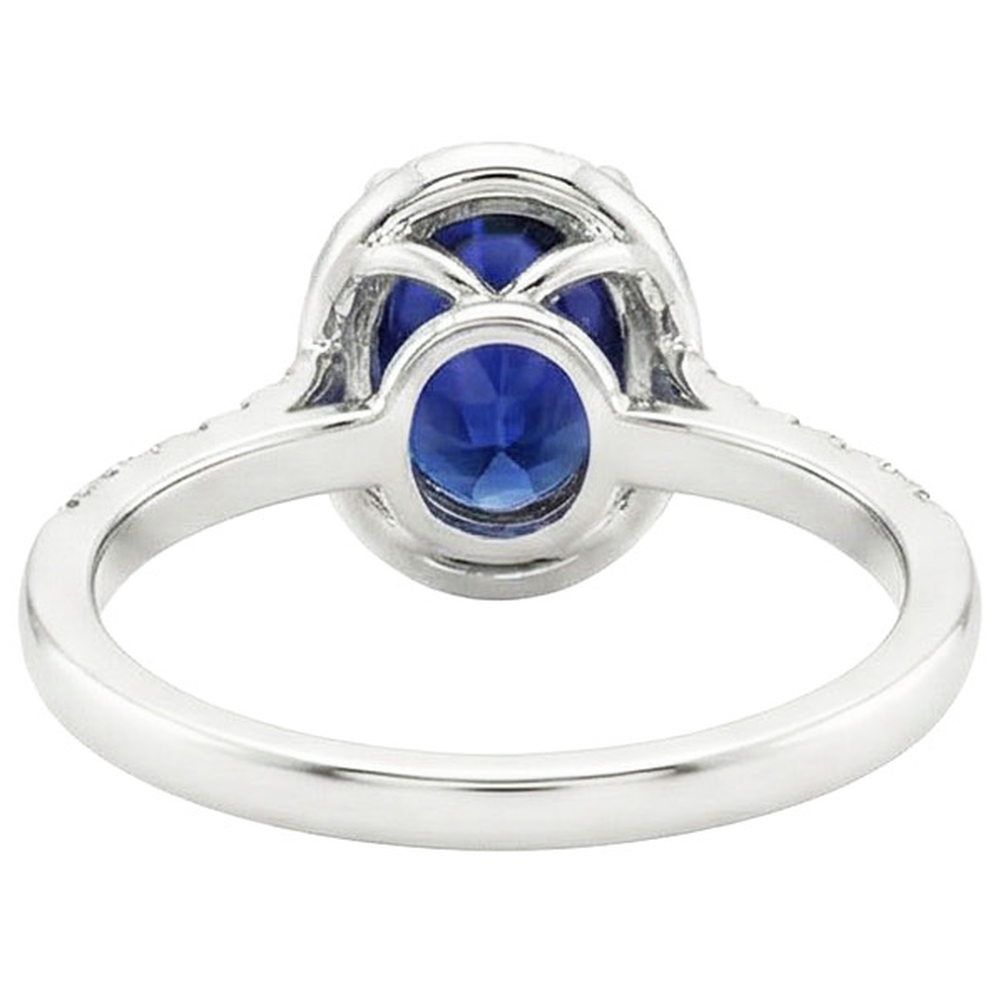 natural round sapphire 4ct ring on white background