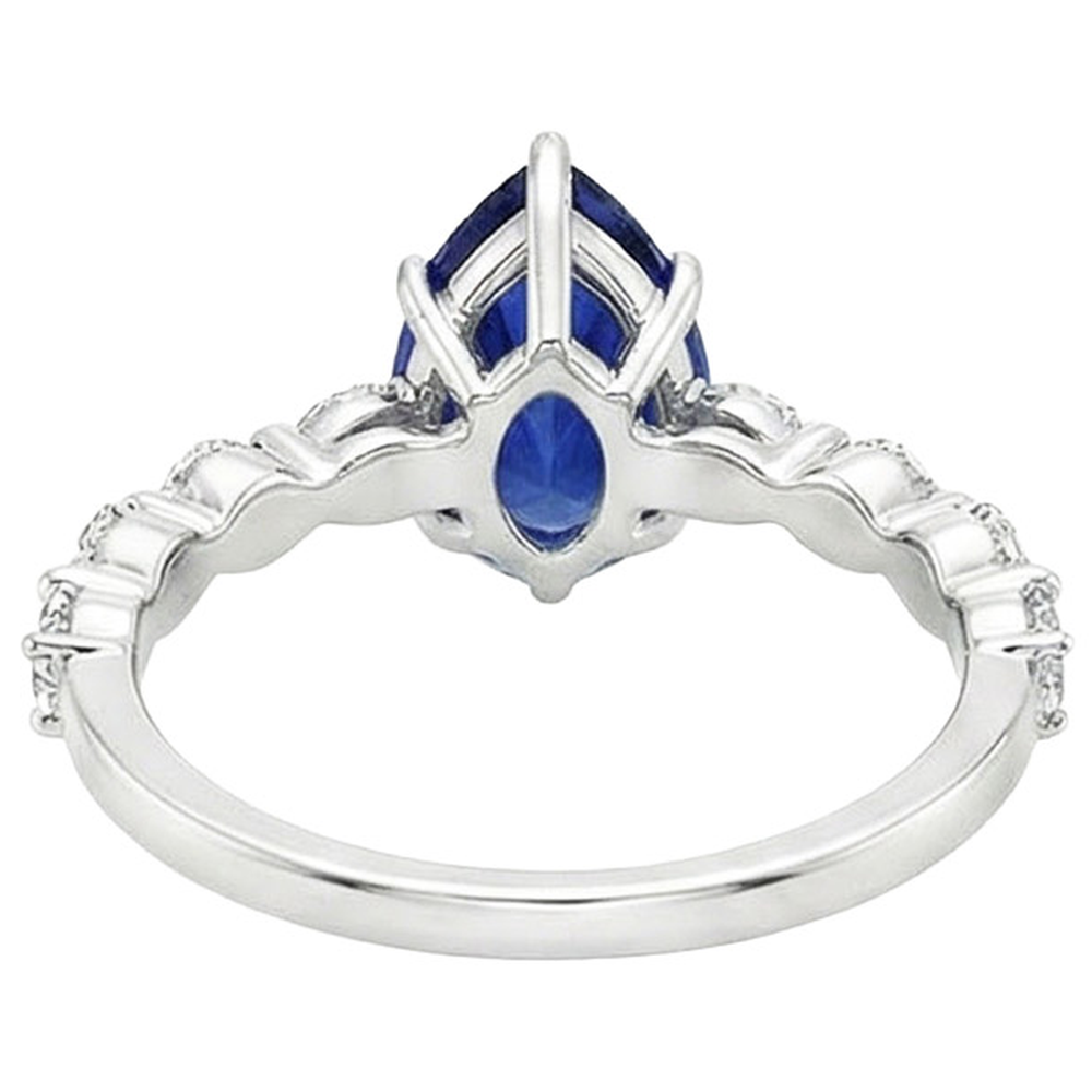 Pear Natural Earth Mined Diamond Anniversary Ring With Blue Sapphire Center Gold 5 Carats