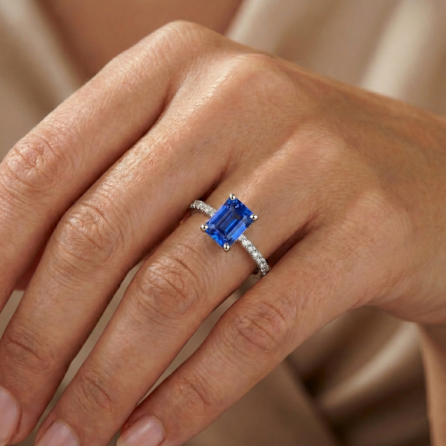 natural round sapphire 3ct ring on white background