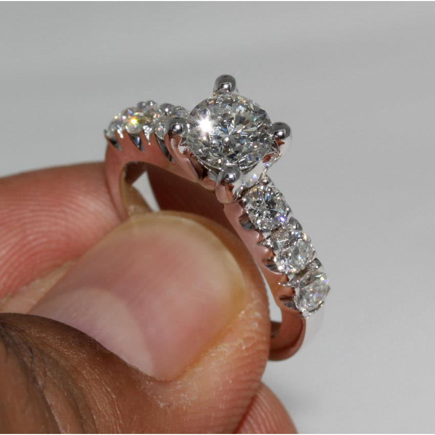 Solitaire Ring with Accents White Gold Diamond Solitaire Ring with Accents