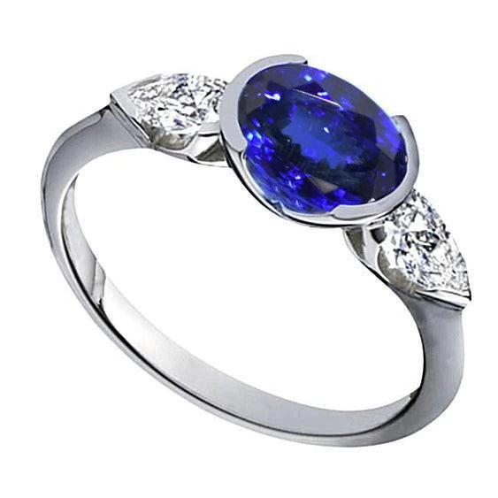 3-Stone Oval Tanzanite Diamond Ring White Gold