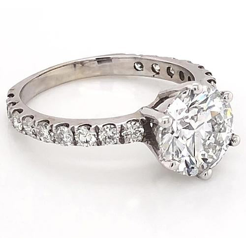 Gorgeous fancy ringh White Gold Sloitaire ring with Accents