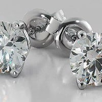 Lady’s White Gold Round Anniversary Stud Earrings