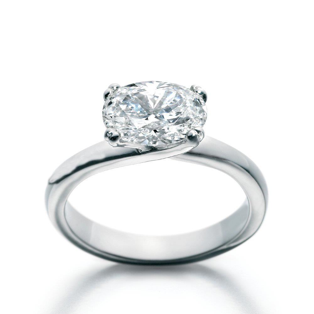 Woman's White Gold Diamond Engagement Ring Solitaire Ring