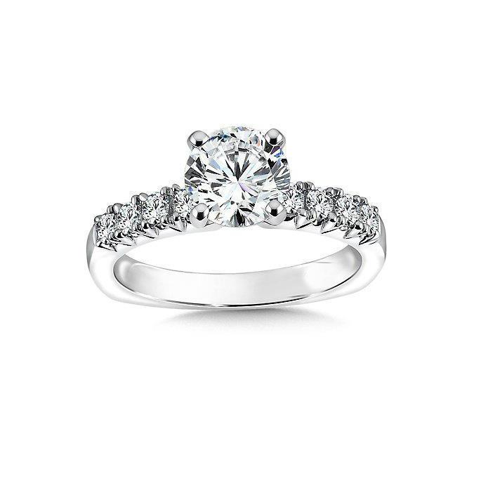Lady’s White Gold Round Anniversary Solitaire Ring with Accents Diamond