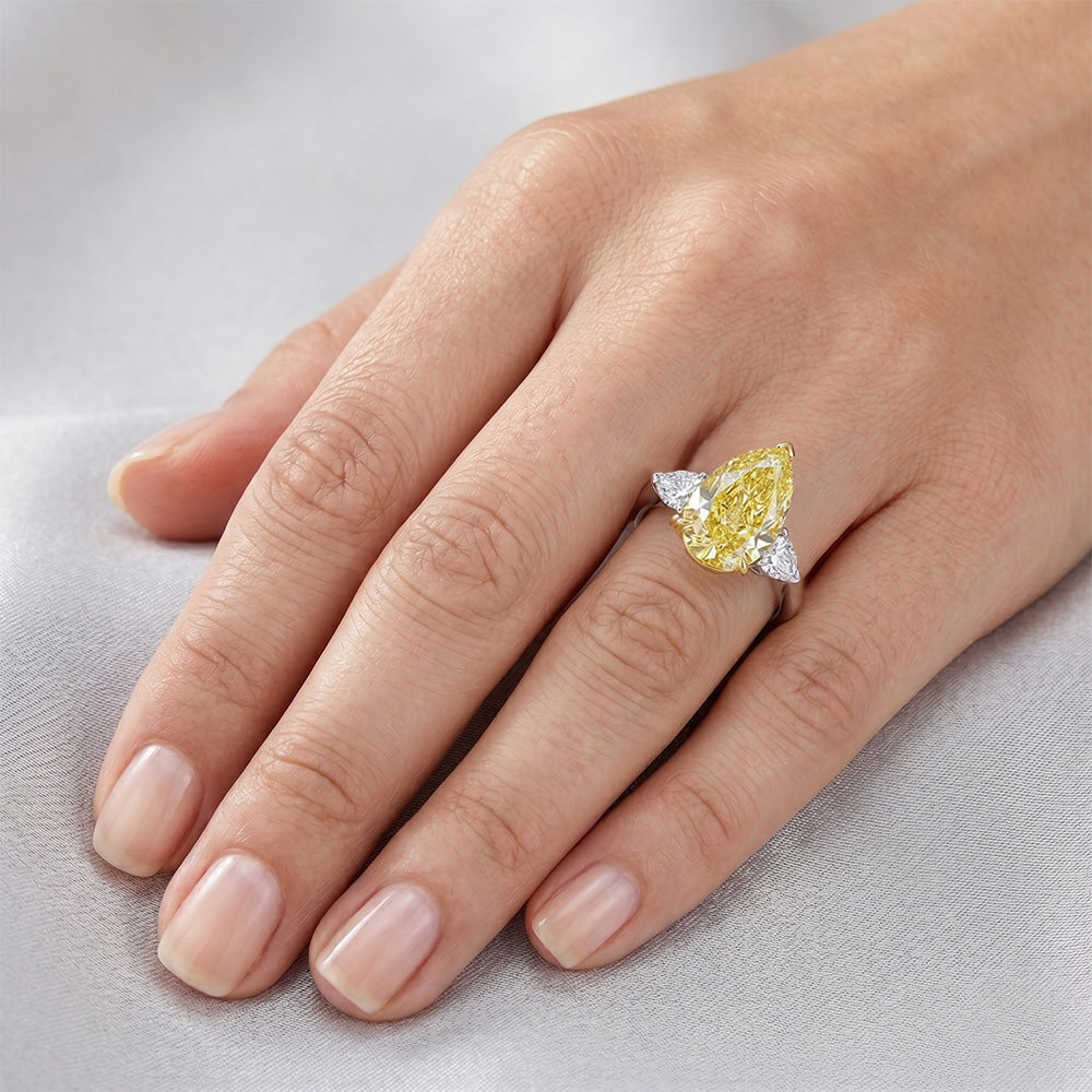 14 Karat Two Tone Gold VVS Canary Yellow Diamond Three Stone