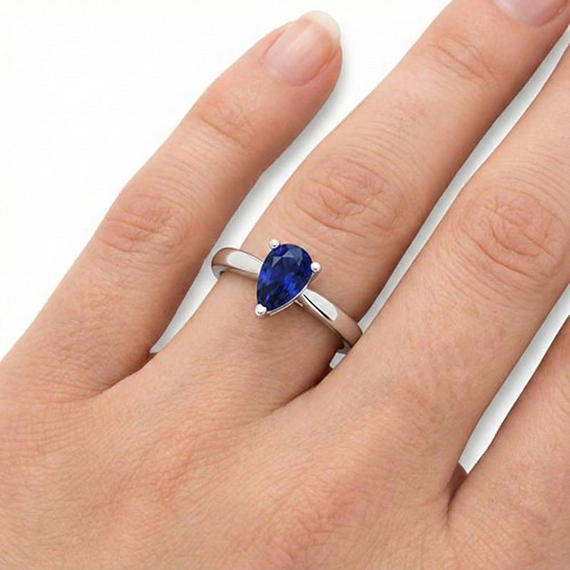 1 Carat Solitaire Pear Deep Blue Sapphire Ring White Gold