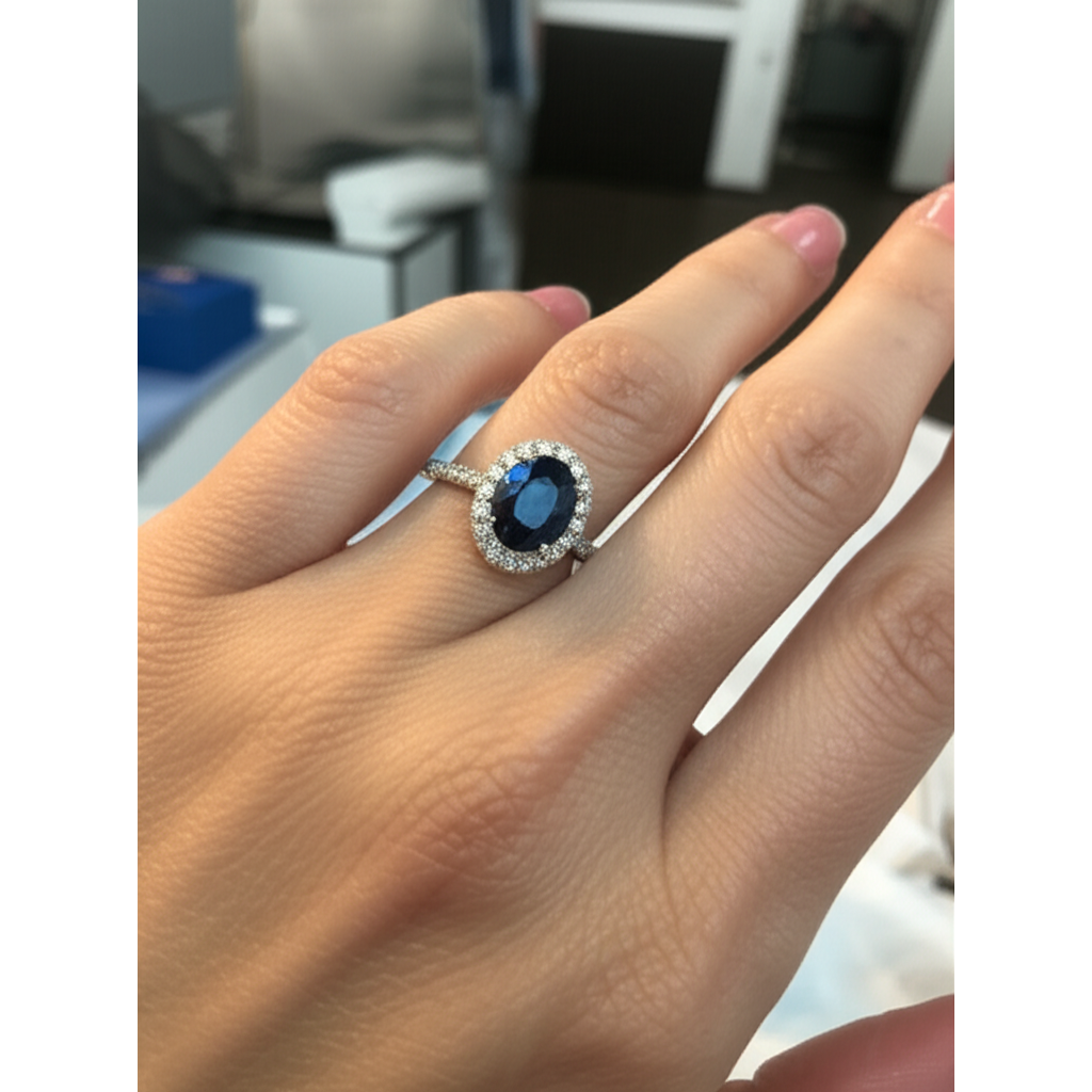 natural round sapphire 2.25ct ring on white background