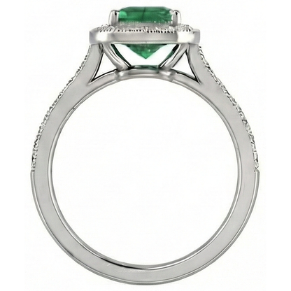 natural round emerald 3ct ring on white background