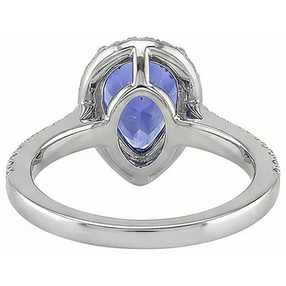 natural round tanzanite 5.75ct ring with diamond accents
