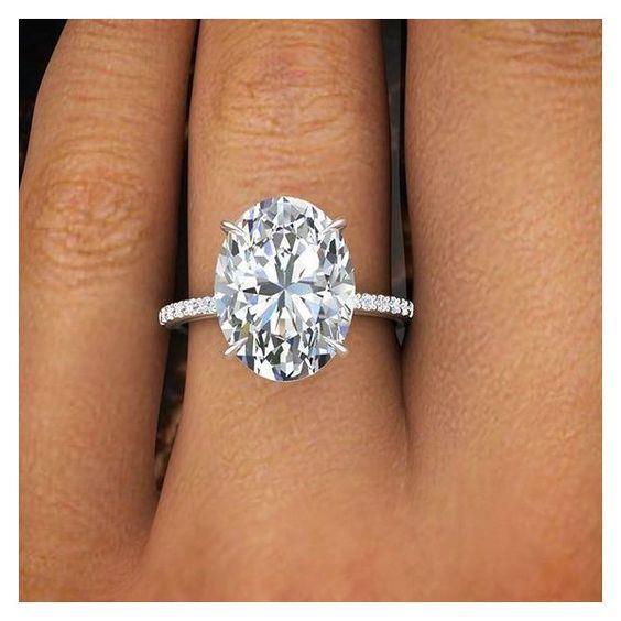 5 Carat Oval Diamond Ring With Accents