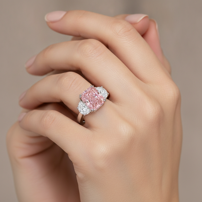 6 Carat Radiant Pink Lab Grown Diamond and White Diamond Three Stone Ring 14K White Gold worn