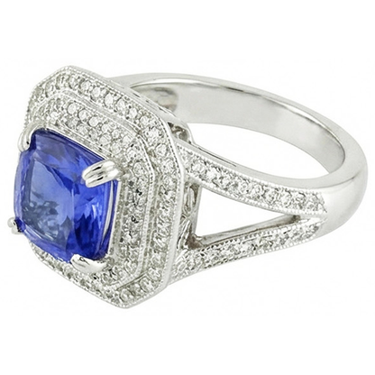 Blue Sapphire With Natural Earth Mined Diamond Halo Ring