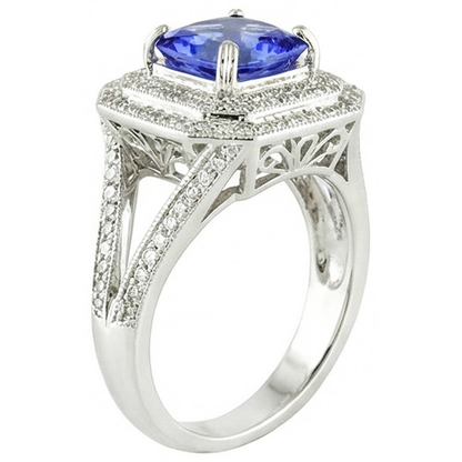 Blue Sapphire With Natural Earth Mined Diamond Halo Ring