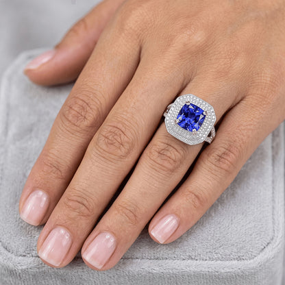 Blue Sapphire With Natural Earth Mined Diamond Halo Ring