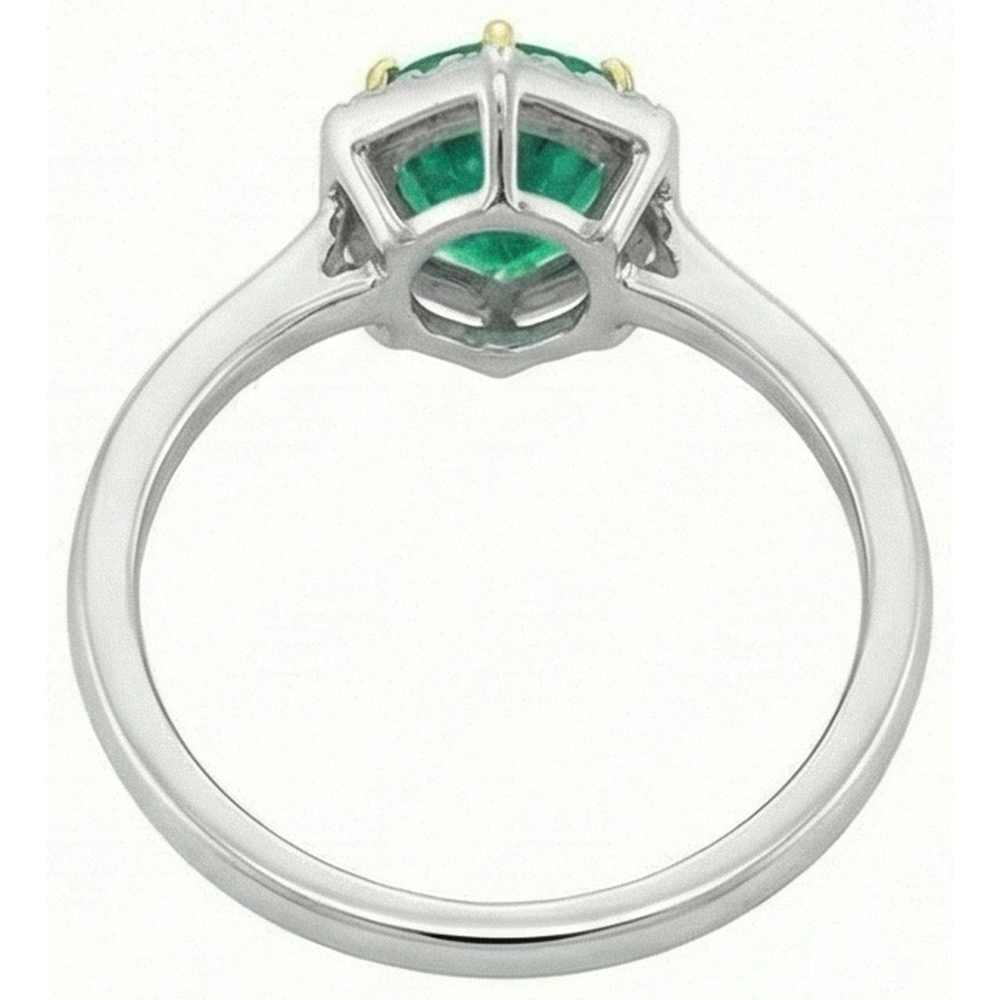 natural round emerald 2ct ring on white background