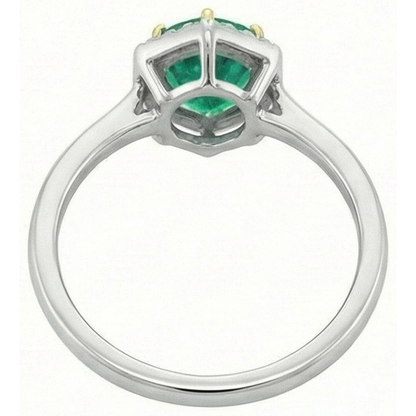natural round emerald 2ct ring on white background
