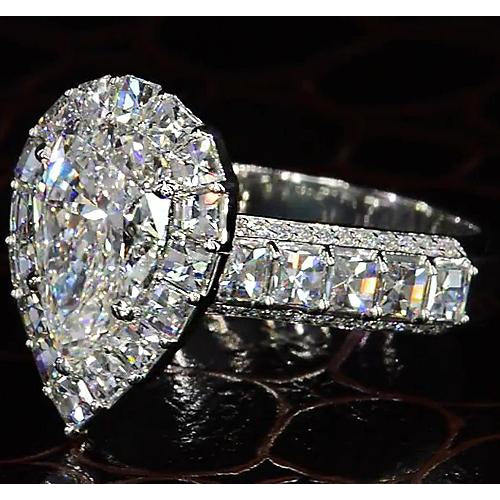 Ladies 9 Carat Halo Pear Diamond Ring