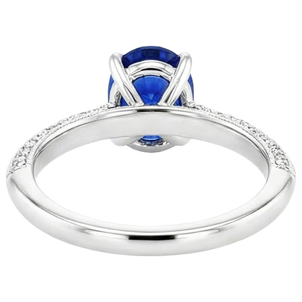 natural round sapphire 5.50ct ring on white background