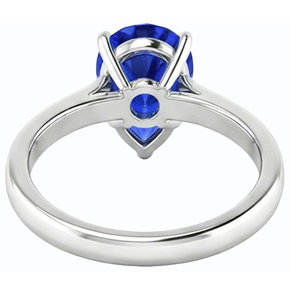 natural pear sapphire 2ct ring on white background