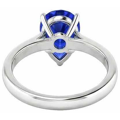 natural pear sapphire 2ct ring on white background