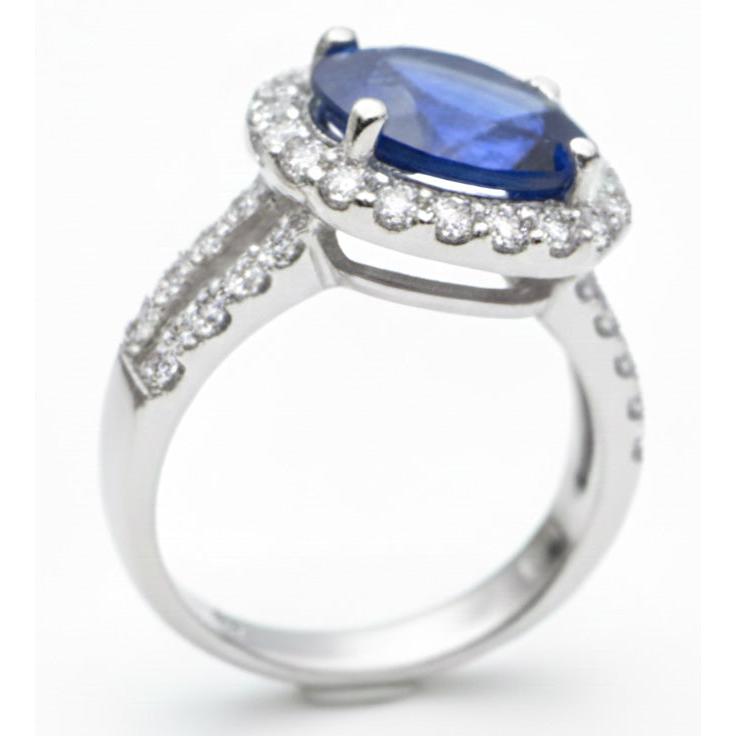 Oval Cabochon Sapphire Ladies Halo Ring