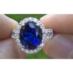 Oval Cabochon Sapphire Ladies Halo Ring
