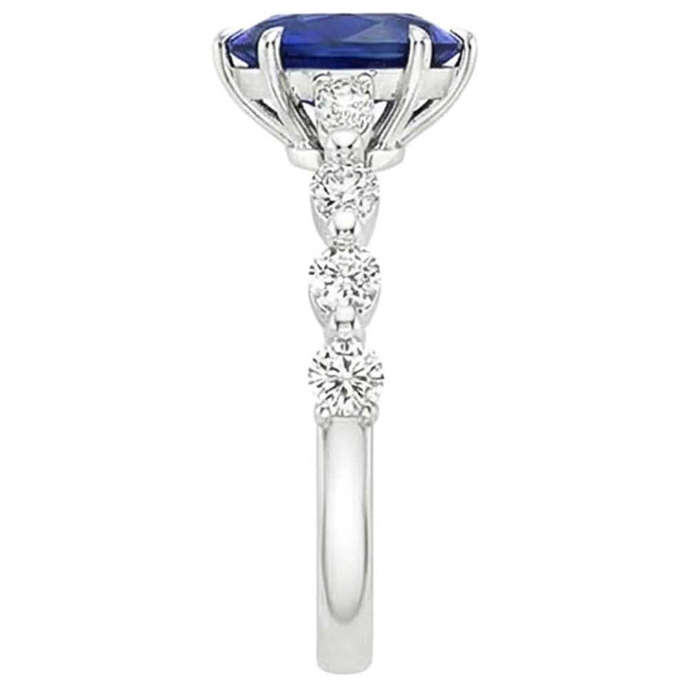 Pear Natural Earth Mined Diamond Anniversary Ring With Blue Sapphire Center Gold 5 Carats