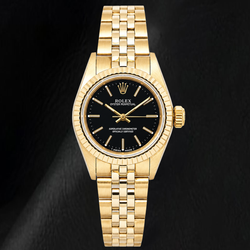 Rolex 67197 Oyster Prepetual Black Stick Dial 24mm Yellow Gold Ladies Watch