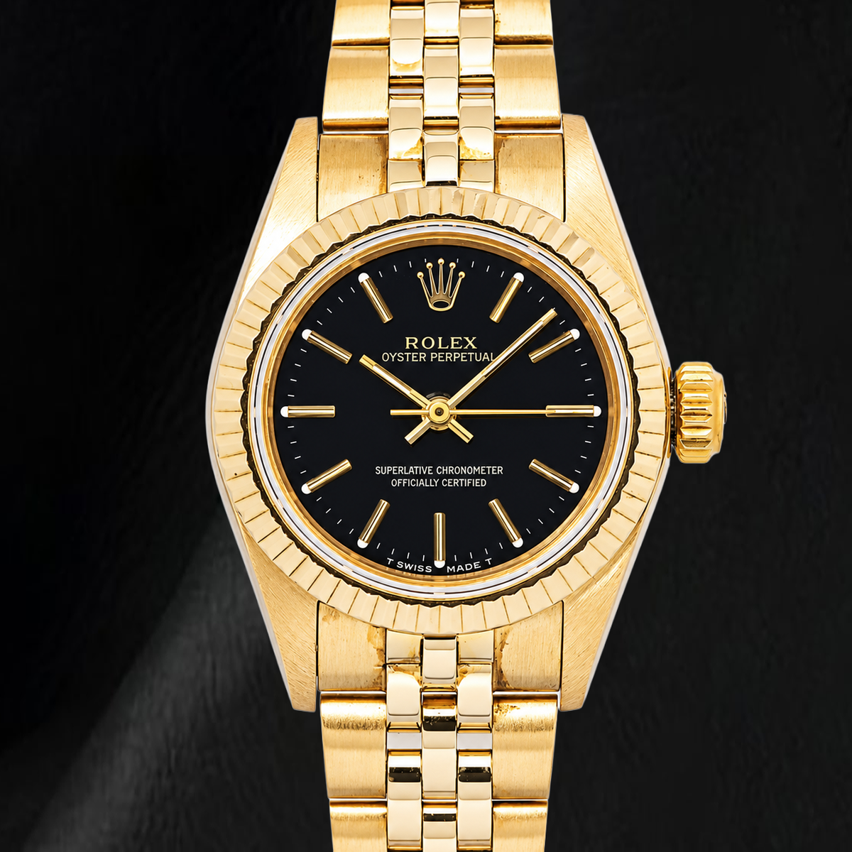 Rolex 67197 Oyster Prepetual Black Stick Dial 24mm Yellow Gold Ladies Watch