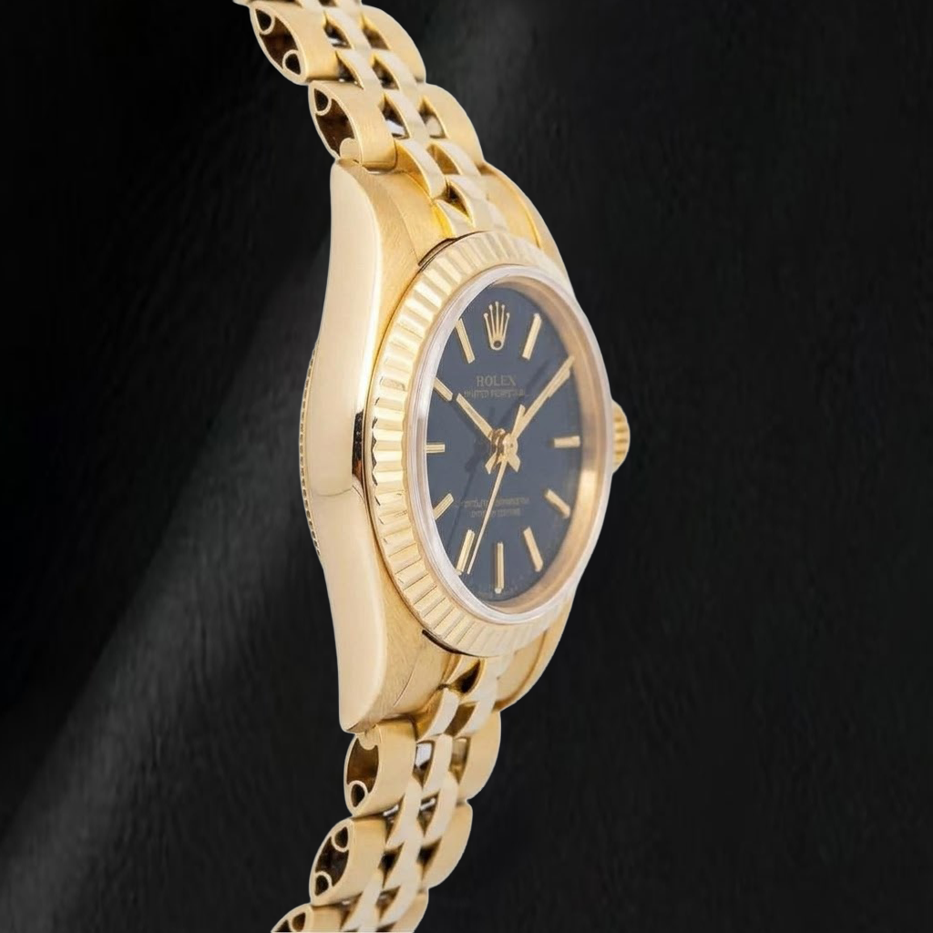 Rolex 67197 Oyster Prepetual Black Stick Dial 24mm Yellow Gold Ladies Watch