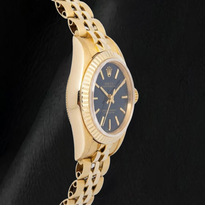 Rolex 67197 Oyster Prepetual Black Stick Dial 24mm Yellow Gold Ladies Watch