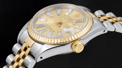 Rolex Datejust 69173 26mm Champagne Baguette Diamond Dial Two Tone Watch