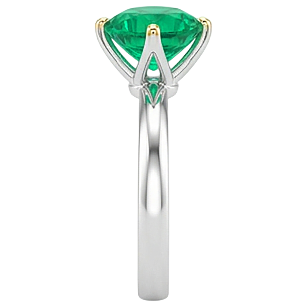natural round emerald 3ct ring on white background