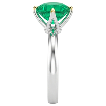 natural round emerald 3ct ring on white background
