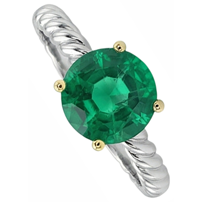 natural round emerald 3ct ring close up detail