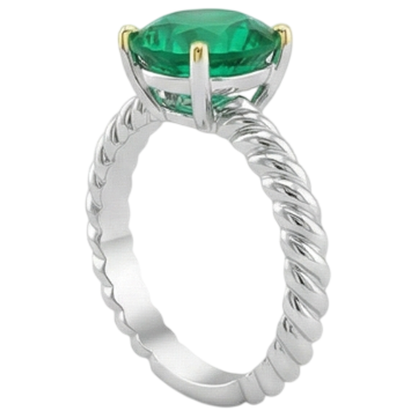 natural round emerald 3ct ring on white background