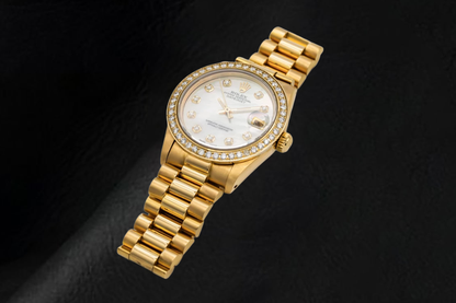 Yellow Gold Presidential Rolex 31 mm White Mother Of Pearl Diamond Dial Watch