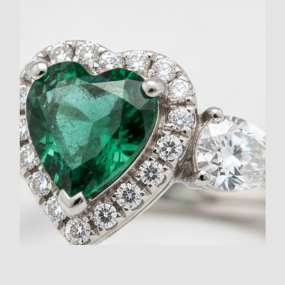 Heart Cut Emerald and Diamond Three Stone Halo Ring Natural Platinum