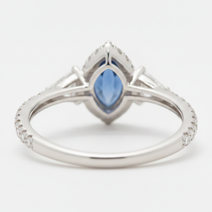 Marquise Blue Sapphire and Diamond Three Stone Halo Ring Natural Platinum
