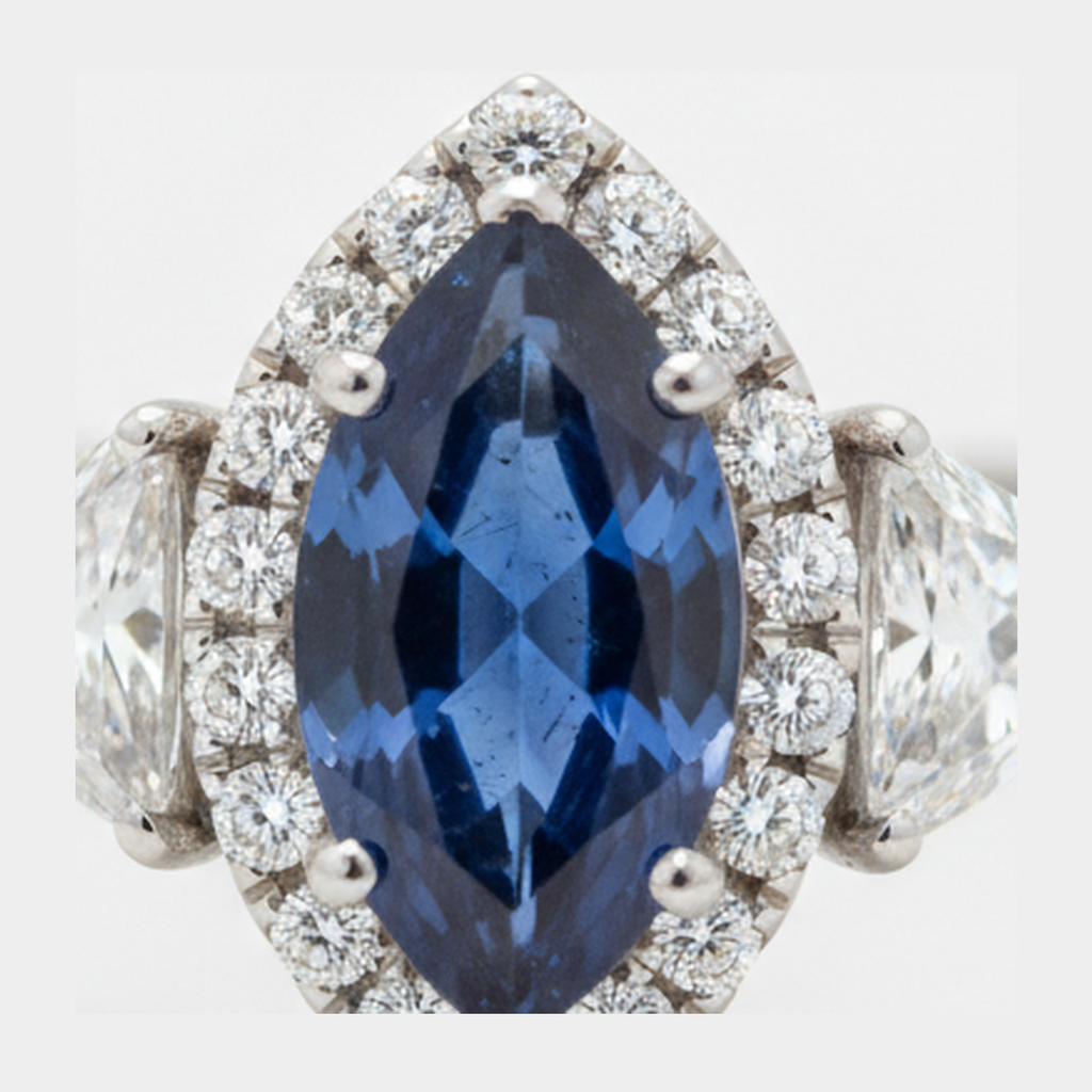 Marquise Blue Sapphire and Diamond Three Stone Halo Ring Natural Platinum