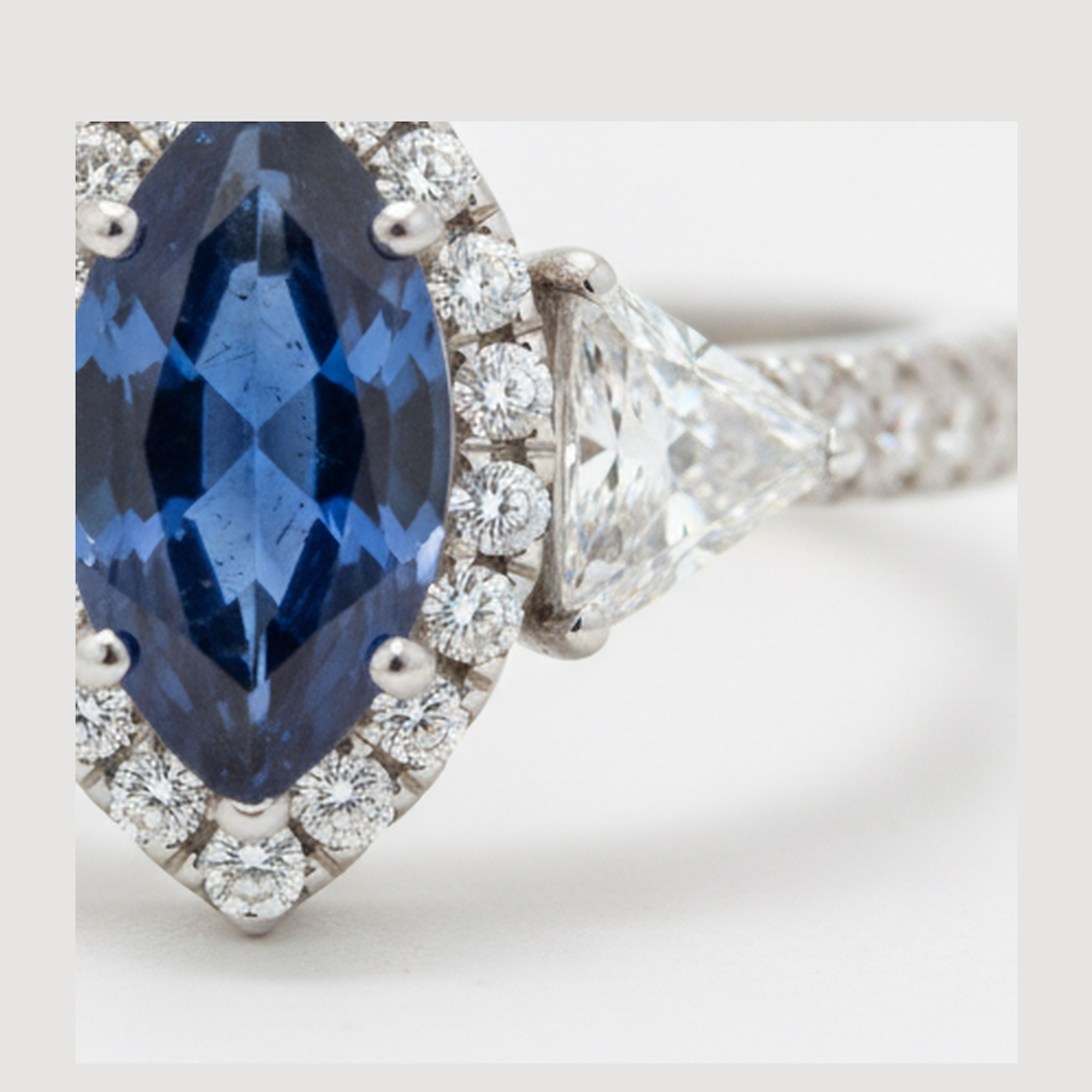 Marquise Blue Sapphire and Diamond Three Stone Halo Ring Natural Platinum