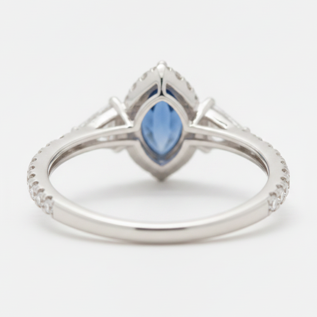 Marquise Blue Sapphire and Diamond Three Stone Halo Ring Natural Platinum