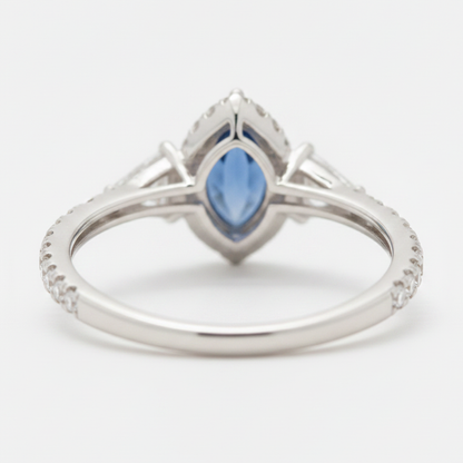 Marquise Blue Sapphire and Diamond Three Stone Halo Ring Natural Platinum