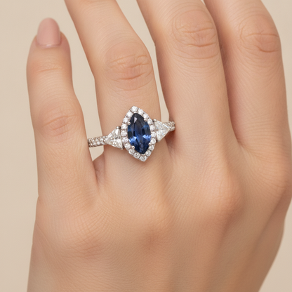 Marquise Blue Sapphire and Diamond Three Stone Halo Ring Natural Platinum