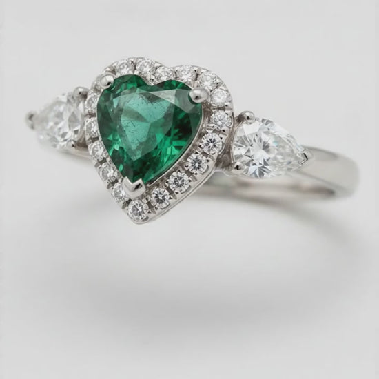Heart Cut Emerald and Diamond Three Stone Halo Ring Natural Platinum