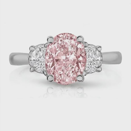 3.5 Carat Oval Pink Lab Grown Diamond and White Diamond Three Stone Ring 14K White Gold