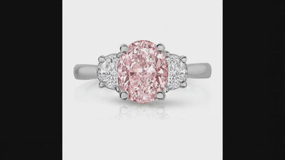 3.5 Carat Oval Pink Lab Grown Diamond and White Diamond Three Stone Ring 14K White Gold
